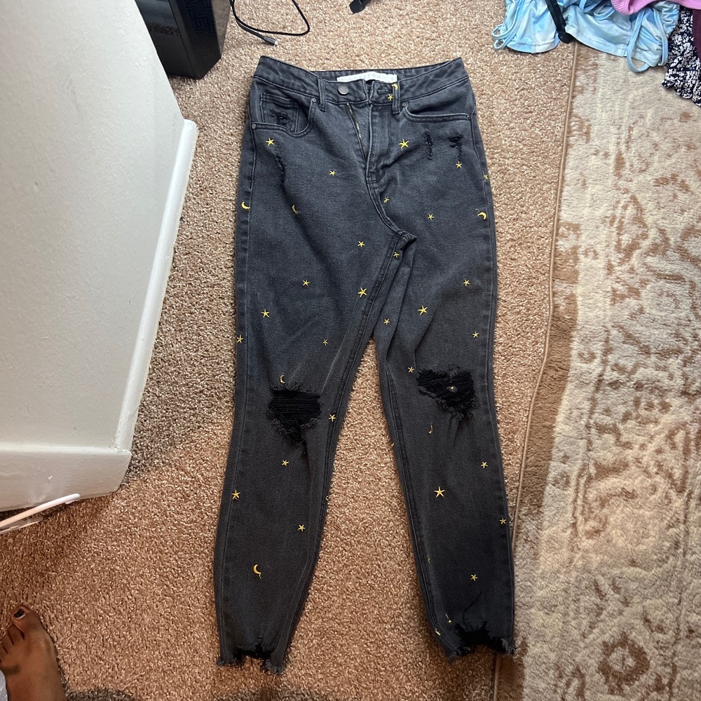 Black Ripped Jeans with Stars and Moons